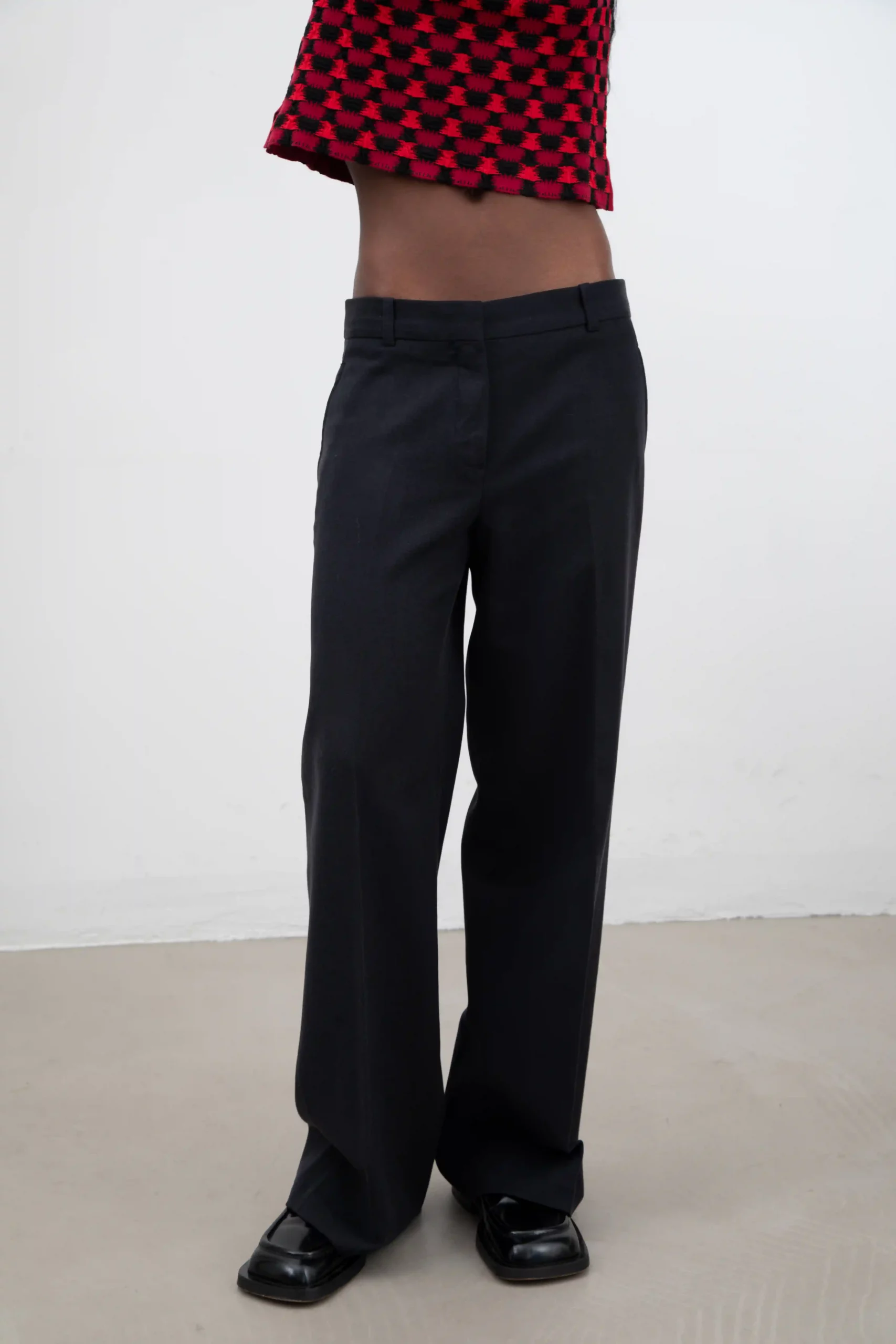 Gorgeous Miu Miu wide leg tailored pants in 65% virgin wool and 35% cotton. With front zipper and hook-and-eye closure. Side pockets. With buttoned welt pocket at back. Made in Italy.