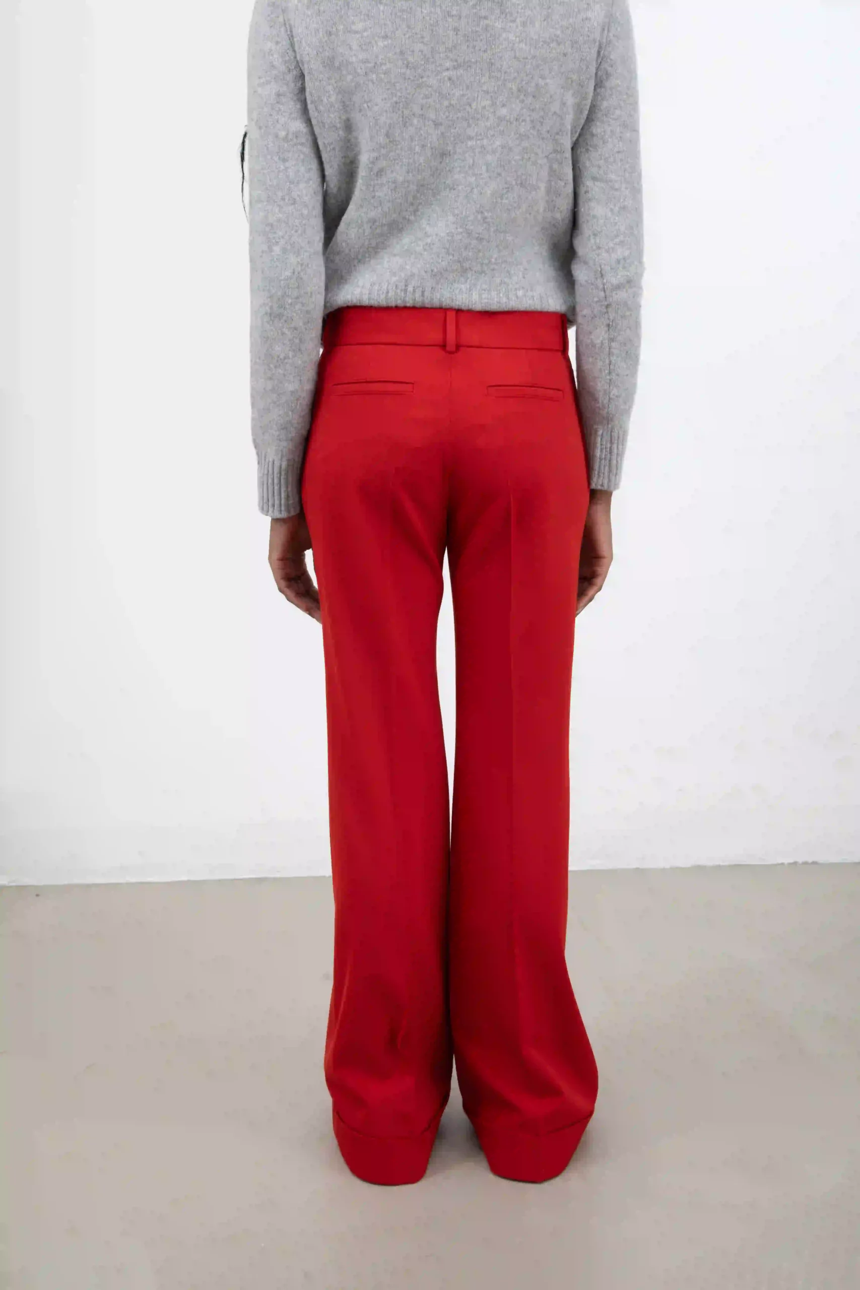 Gorgeous Pompeian red Acne Studios pants, palazzo model. With stitched pleat on the front. Button and zipper closure. Welt pockets on the back.