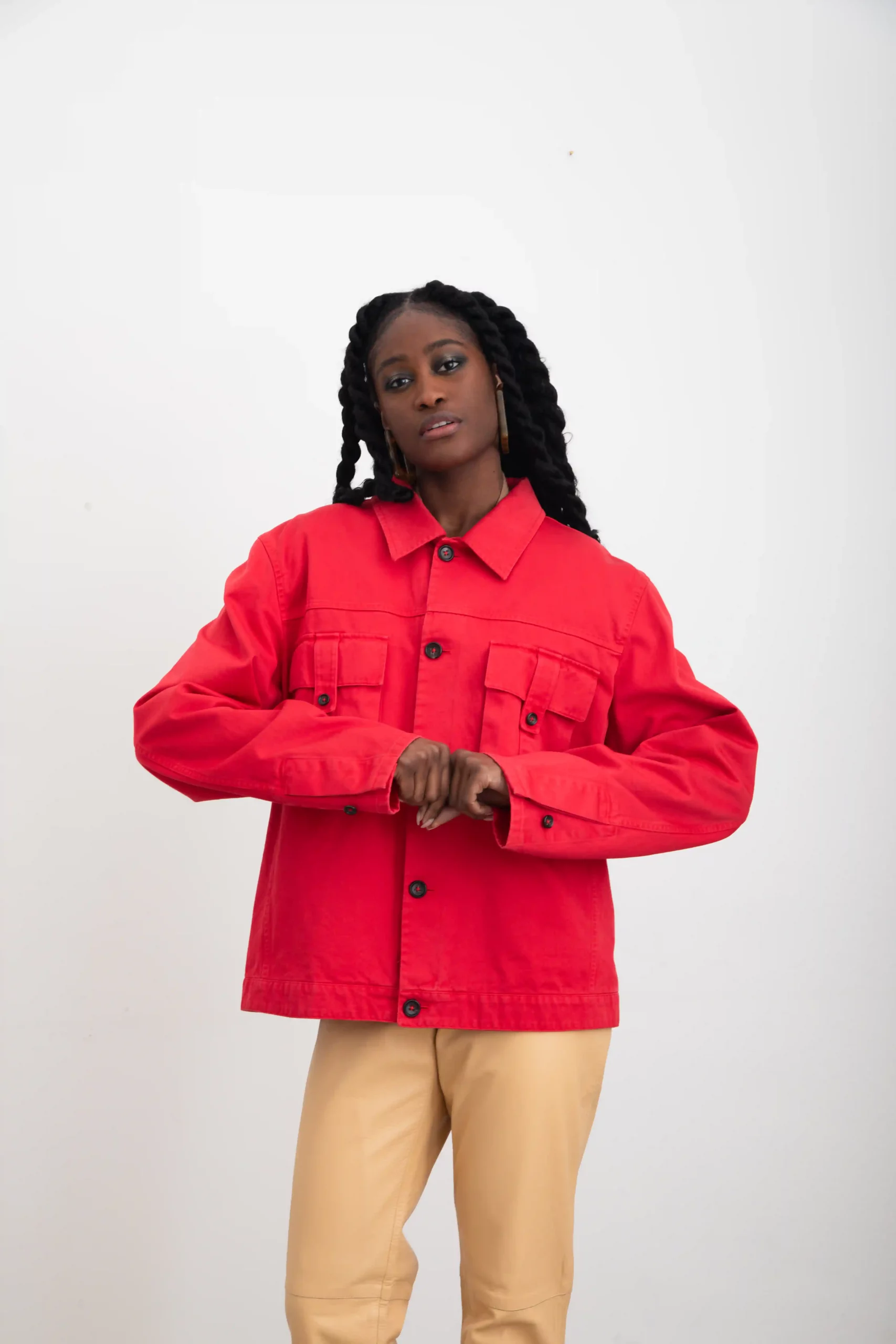 Jil Sander jacket in red 100% cotton drill. With patch pockets and button closure. Adjustable cuffs and bottom hem with double buttons.